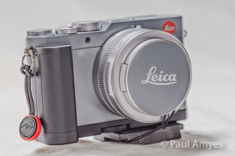 My Leica D-Lux pimped out with its accessory grip, tripod adapter and Peak Designs Anchor Link.